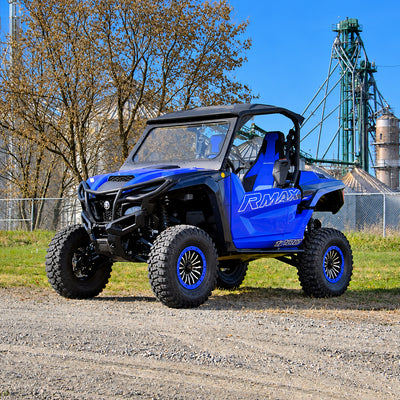 Yamaha Wolverine RMAX2 1000 with PERFEX 2-inch lift kit installed, front angle view.