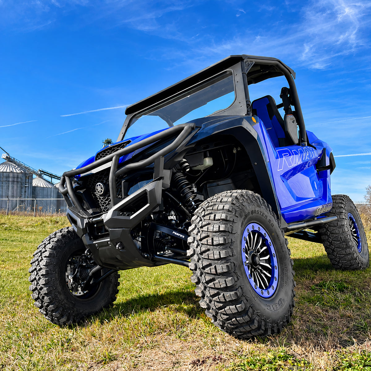 Yamaha Wolverine RMAX2 1000 with PERFEX 2-inch lift kit installed, low front angle view.