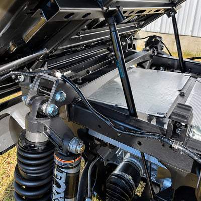 Rear suspension installation detail of the PERFEX 2-inch lift kit on Yamaha Wolverine RMAX2 1000.
