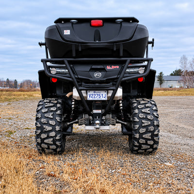 Rear view of a CFMOTO CForce 800XC with a PERFEX 2-inch lift kit, showing the rear suspension and ground clearance.