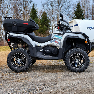 Side profile of a CFMOTO CForce 800XC with a PERFEX lift kit, highlighting its elevated ground clearance.
