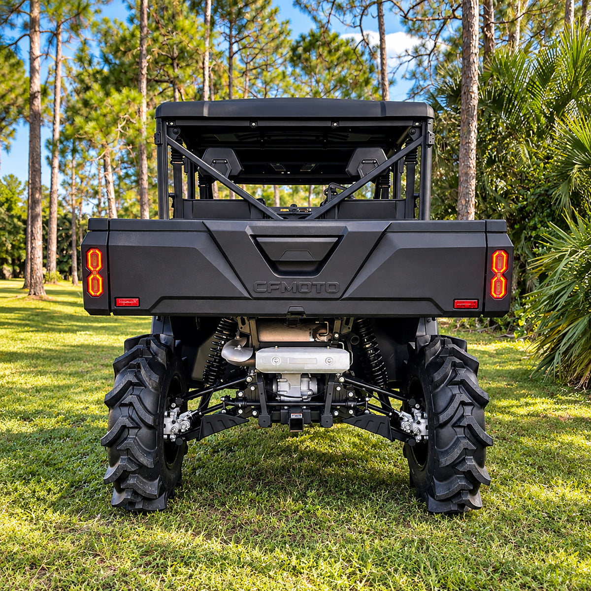 Rear view of a lifted CFMOTO UForce 1000 XL showing its suspension, drivetrain and ground clearance with a PERFEX 2-inch lift.